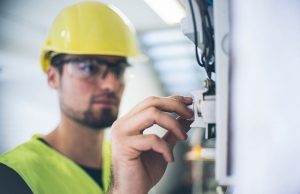 An electrician fixing up the wires