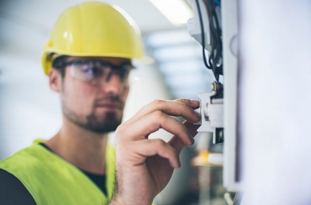 An electrician fixing up the wires